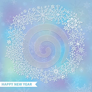 Snowflake wreath on blur background