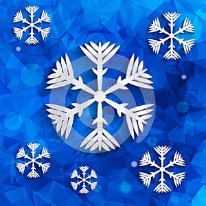 Snowflakes on blue geometric background with triangular po