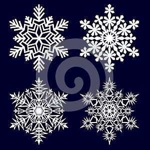 Snowflakes collection isolated on dark background.