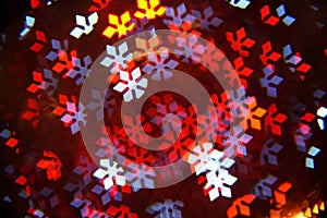 Snowflakes lights. Abstract christmas background with bright snowflakes