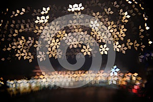 Snowflakes lights. Abstract christmas background with bright snowflakes