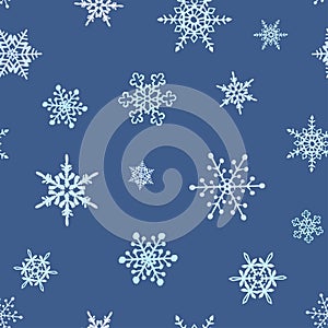 Snowflakes seamless pattern of many snowflakes on the blue background vector