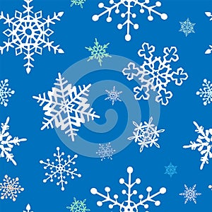 Snowflakes seamless pattern of many snowflakes on the blue background vector