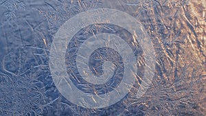 Snowflakes on the window in supermacro shooting.