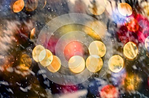 Snowing Abstract pattern with snowing against winter forest and bokeh lights winter forest and bokeh lights photo
