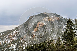 Snowing on Cheyenne Mountain Colorado Springs