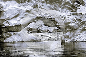 Snowing Floating Blue Iceberg Arch Reflection Paradise Bay Skintorp Cove Antarctica