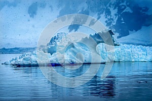 Snowing Floating Blue Iceberg Reflection Paradise Bay Skintorp Cove Antarctica