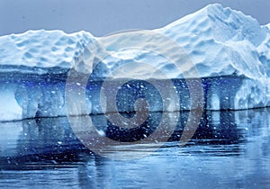 Snowing Floating Blue Iceberg Reflection Paradise Bay Skintorp Cove Antarctica