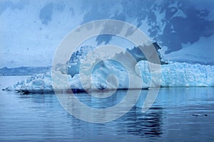 Snowing Floating Blue Iceberg Reflection Paradise Bay Skintorp Cove Antarctica