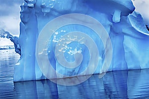 Snowing Floating Blue Iceberg Reflection Paradise Bay Skintorp Cove Antarctica