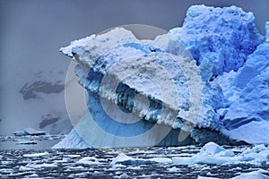 Snowing Floating Blue Iceberg Reflection Paradise Bay Skintorp Cove Antarctica