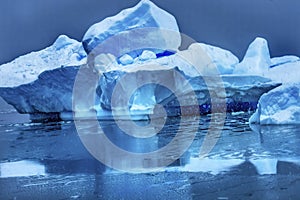 Snowing Floating Blue Iceberg Reflection Paradise Bay Skintorp Cove Antarctica