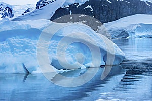 Snowing Floating Blue Iceberg Reflection Paradise Bay Skintorp Cove Antarctica