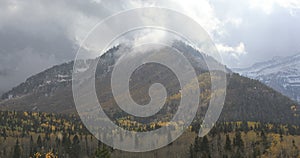 Snowing over mountains in Utah