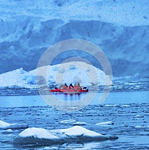 Snowing Red Kayak Iceberg Blue Glacier Paradise Harbor Antarctica