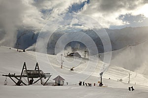 Snowmaking in early season photo