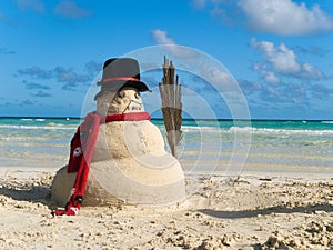 Muneco de nieve sobre el Playa 