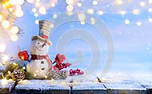 Snowman and Christmas tree decoration; background or season holidays banner