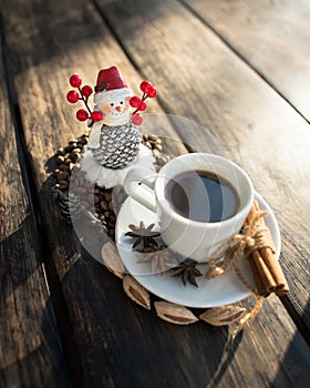 Snowman and cup of coffee