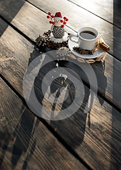 Snowman and cup of coffee