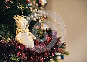 Snowman decoration on Christmas tree