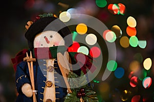 Snowman Doll with Skis and Christmas Lights