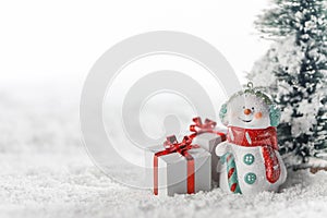 Snowman and gift