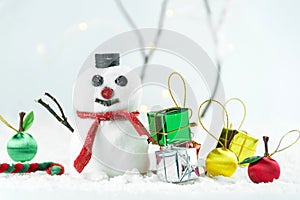 Snowman and gift in new year and christmas concept