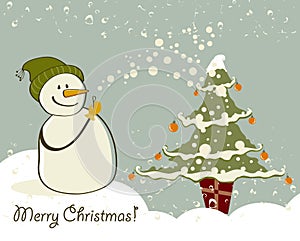 Snowman with gifts beside christmas tree