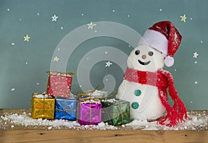 Snowman hat santa and Colorful gift box