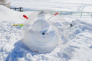 Snowman on mountains