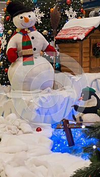 Snowman and the penguin - christmas concept