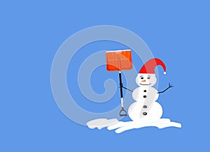 Snowman with red hat and shovel