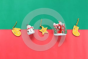 Snowman, santa claus and christmas or new year decoration or ornament on red and green background