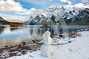 Snowman or Snow Man Early Winter Snowfall Cold Temperature Beautiful Mountains Blue Lake Banff National Park Canada
