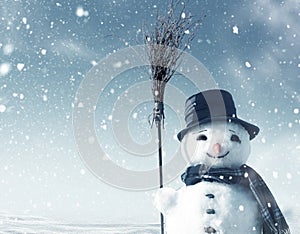 Snowman standing in christmas landscape