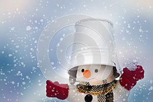 Snowman is standing in snowfall, Merry Christmas and happy New Y