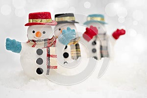 Snowman is standing in snowfall, Merry Christmas and happy New Year concept