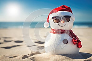 Snowman with sunglasses on the beach. Christmas and New Year concept, Happy sandy snowman with sunglasses and Santa hat on a sunny