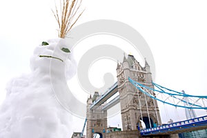 Snowman and Tower Bridge, London, UK