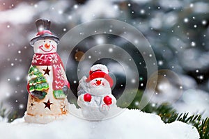 Snowman toys on a spruce