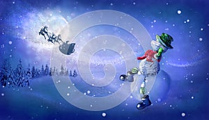 Snowman with virus mask sees off Santa`s magic sleigh with reindeer flying at night over fairy forest with moon