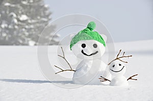 Snowmen against Swiss Alps