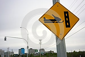 Snowmobile crossing sign on 48th street in Yellowknife, Canada