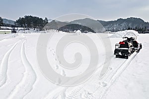 Snowmobile parking in the mountains ski resort