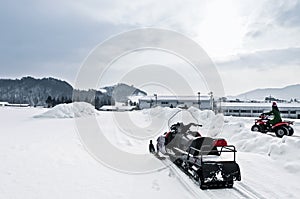 Snowmobile parking in the mountains ski resort