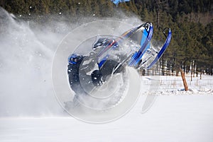 Snowmobile Rider Jumping