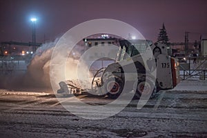 Snowplow clearing road