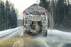 A snowplow on the highway